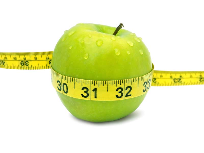 green apple tie using measure tape